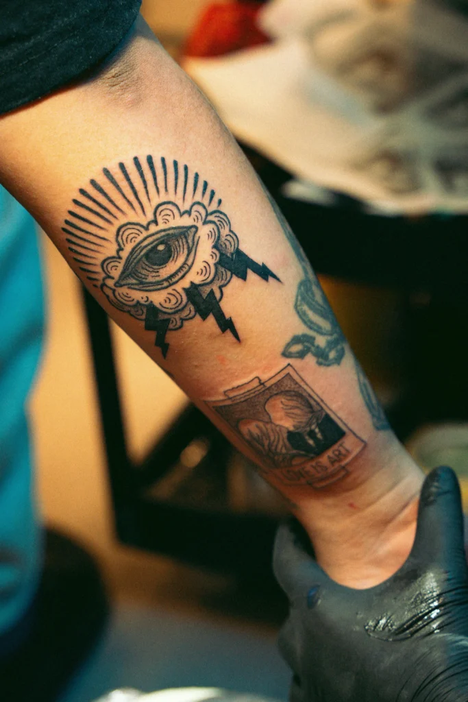 a person's arm with Trend Tattoos